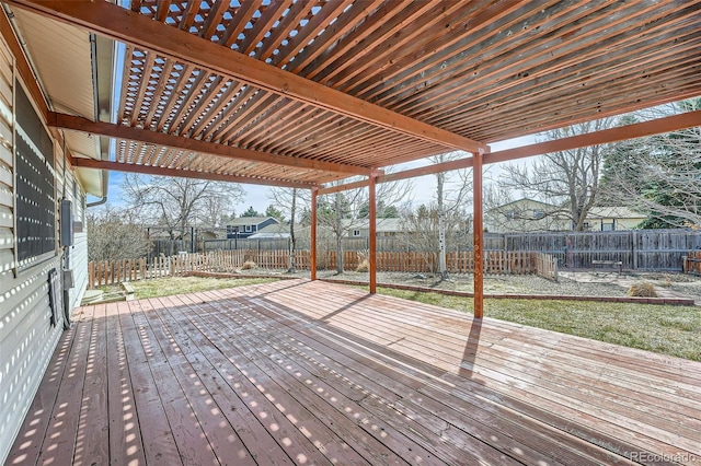 wooden terrace featuring a fenced backyard and a pergola