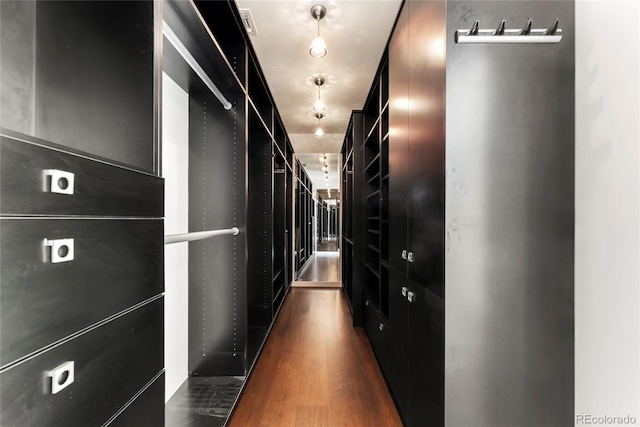 hallway featuring dark wood-type flooring