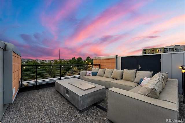 view of patio / terrace with a balcony and an outdoor hangout area