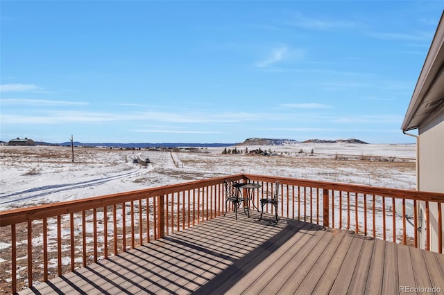 view of snow covered deck