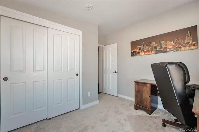 home office with baseboards and carpet flooring