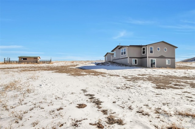 view of snow covered property