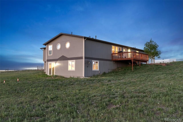 11100 Haskell Creek Rd, Larkspur, CO 80118 - rear view of house with a deck and a yard