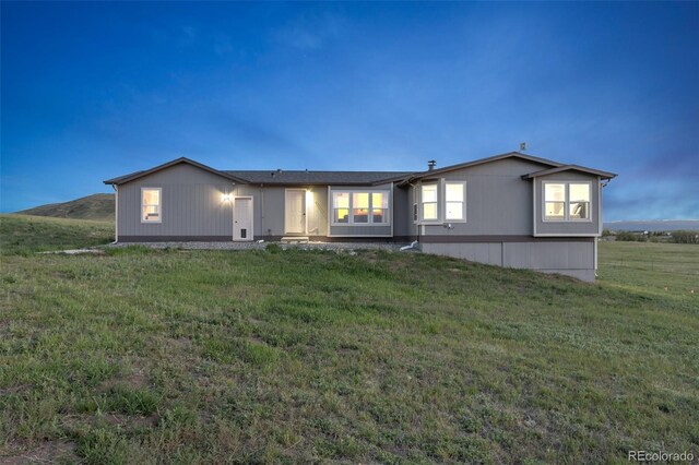 11100 Haskell Creek Rd, Larkspur, CO 80118 - view of front of property featuring a front yard