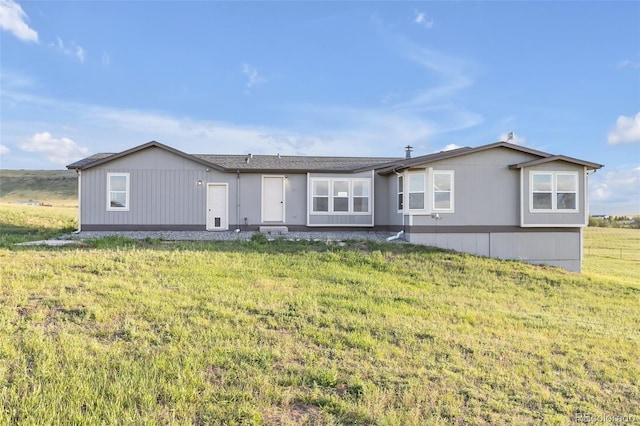 11100 Haskell Creek Rd, Larkspur, CO 80118 - view of front facade featuring a front lawn