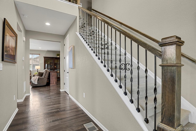 30 S Ider Way, Aurora, CO 80018 - stairway with wood finished floors, baseboards, and recessed lighting