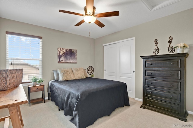 30 S Ider Way, Aurora, CO 80018 - bedroom featuring a closet, light carpet, baseboards, and attic access