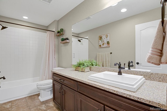 30 S Ider Way, Aurora, CO 80018 - full bath featuring vanity, shower / bath combo with shower curtain, toilet, tile patterned flooring, and recessed lighting