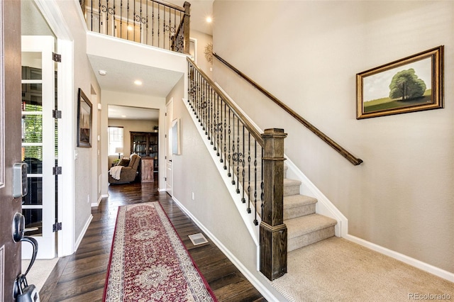 30 S Ider Way, Aurora, CO 80018 - entrance foyer featuring stairway, dark wood-type flooring, and recessed lighting