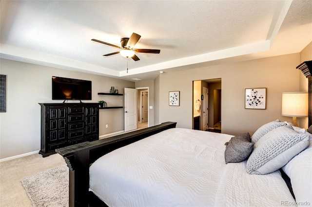30 S Ider Way, Aurora, CO 80018 - bedroom with a tray ceiling, carpet floors, and a ceiling fan