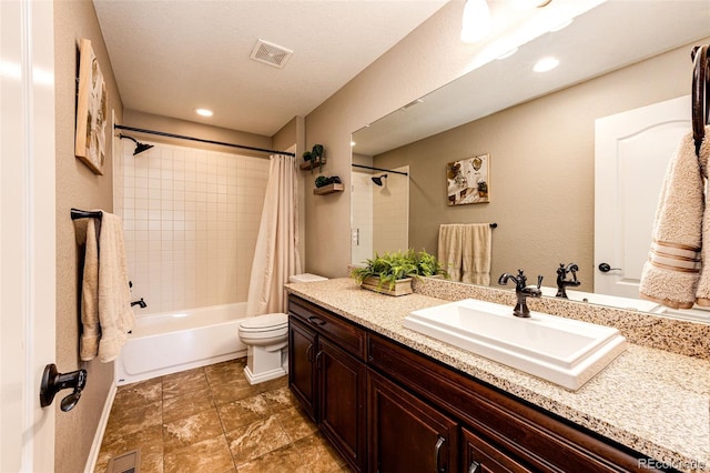 30 S Ider Way, Aurora, CO 80018 - bathroom featuring vanity, shower / bathtub combination with curtain, and recessed lighting
