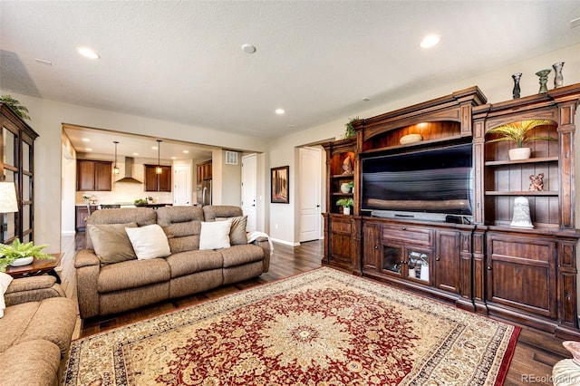 30 S Ider Way, Aurora, CO 80018 - living area with dark wood-type flooring and recessed lighting
