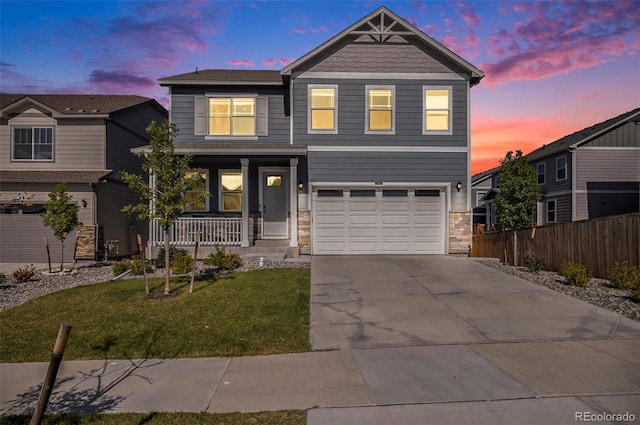 17415 Trefoil Ln, Parker, CO 80134 - craftsman house with a front lawn, stone siding, a porch, concrete driveway, and fence