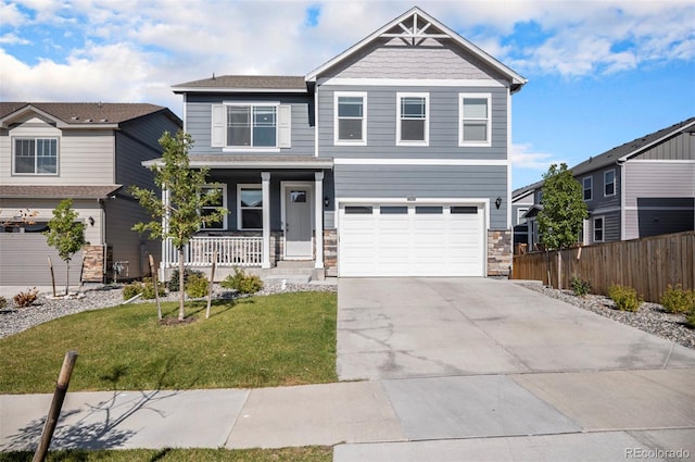 17415 Trefoil Ln, Parker, CO 80134 - craftsman-style house with fence, a front lawn, concrete driveway, covered porch, and stone siding