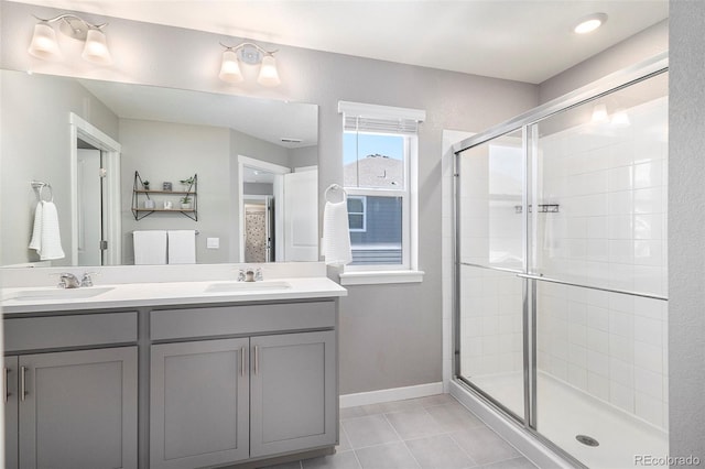 bathroom featuring vanity, tile patterned floors, and an enclosed shower