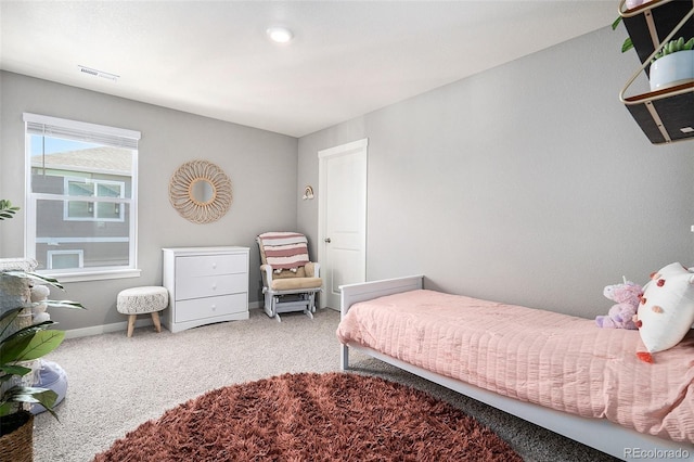 bedroom featuring carpet