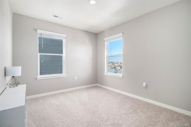 view of carpeted spare room