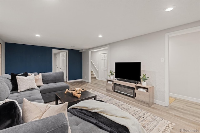 3379 W Wagon Trail Dr, Englewood, CO 80110 - living room with stairway, wood finished floors, recessed lighting, and baseboards