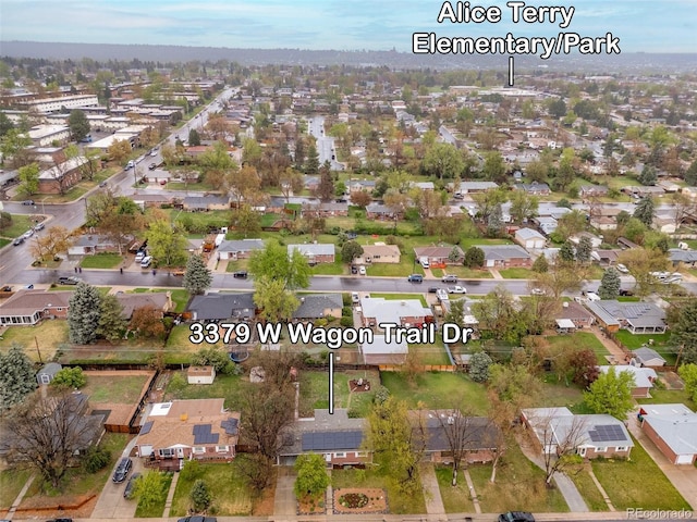 3379 W Wagon Trail Dr, Englewood, CO 80110 - aerial view of property and surrounding area featuring nearby suburban area