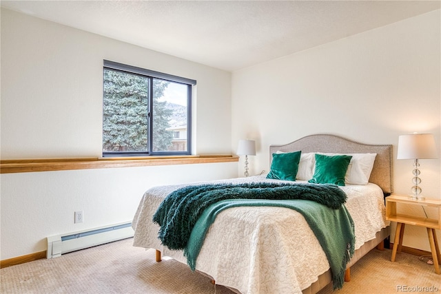 330 Ptarmigan St, Golden, CO 80403 - bedroom featuring baseboard heating, carpet flooring, and baseboards