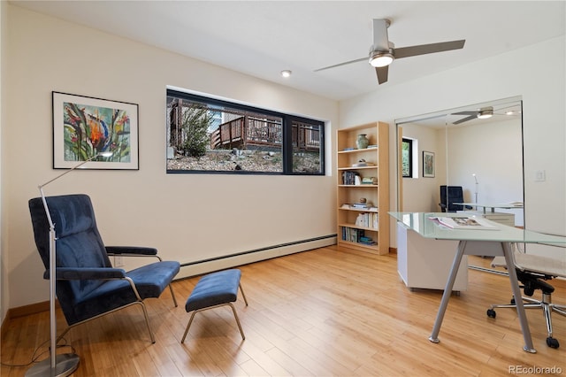 330 Ptarmigan St, Golden, CO 80403 - office with a baseboard heating unit, a ceiling fan, and wood finished floors