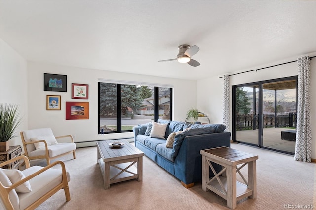 330 Ptarmigan St, Golden, CO 80403 - living area featuring plenty of natural light, ceiling fan, and light colored carpet