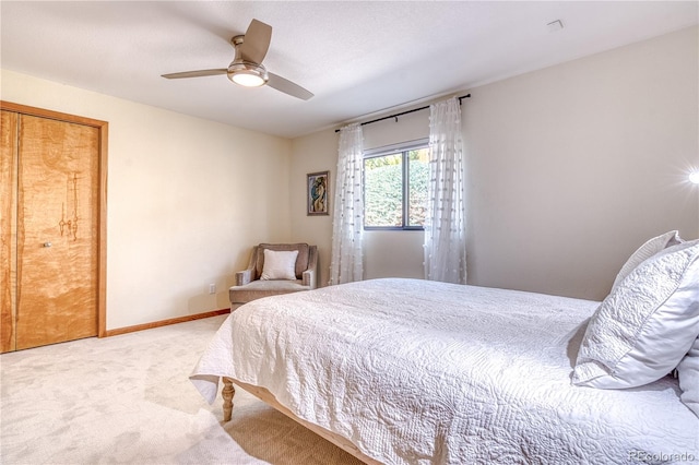 330 Ptarmigan St, Golden, CO 80403 - bedroom featuring light carpet, a ceiling fan, and baseboards