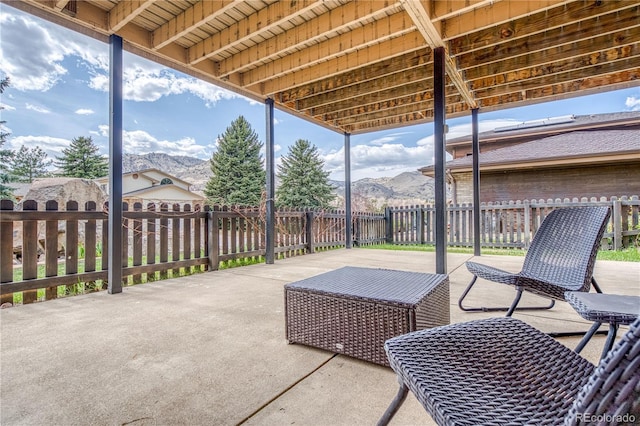 330 Ptarmigan St, Golden, CO 80403 - view of patio with a mountain view and a fenced backyard