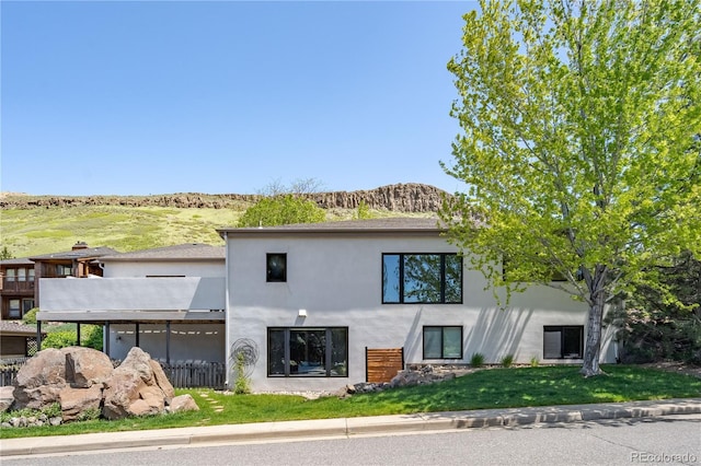 330 Ptarmigan St, Golden, CO 80403 - back of property with stucco siding and a balcony