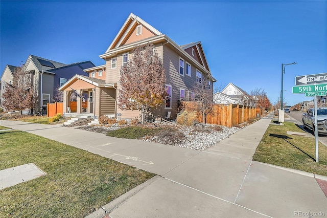 view of front of house featuring a front lawn