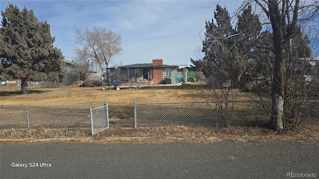 view of yard featuring a trampoline