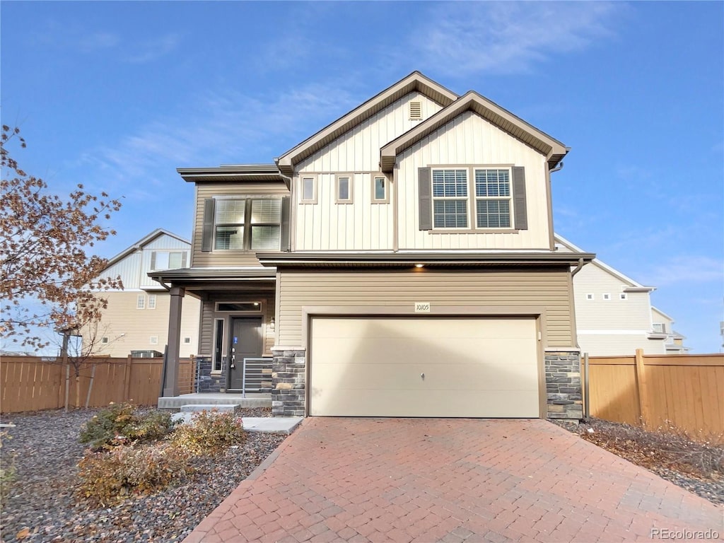 view of front of property with a garage