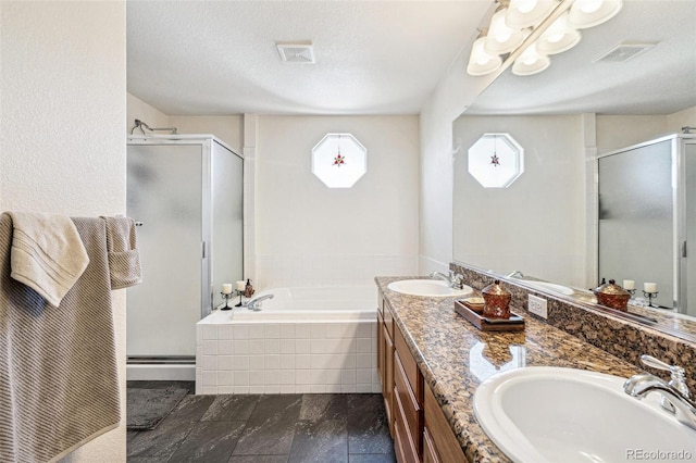 full bath featuring a stall shower, visible vents, and a sink