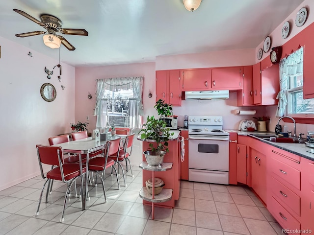 kitchen featuring light tile patterned flooring, sink, ceiling fan, and white appliances