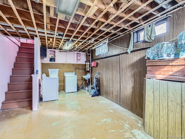 basement featuring washer and clothes dryer