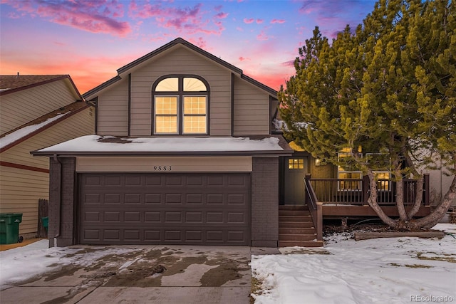 front of property with a garage