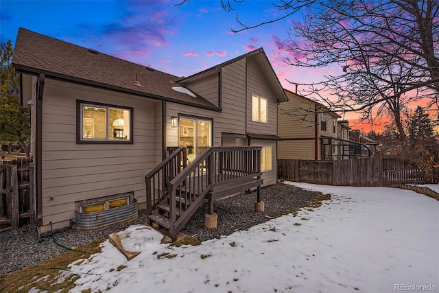 view of snow covered property