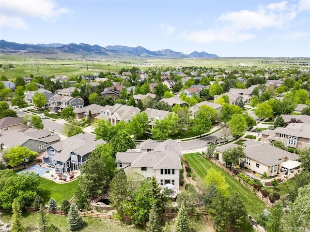 6032 Umber St, Arvada, CO 80403 - aerial view of residential area with a mountain backdrop
