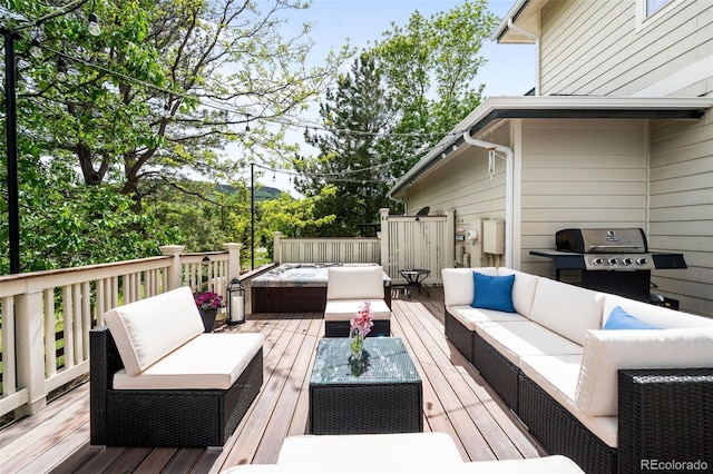 6032 Umber St, Arvada, CO 80403 - wooden deck featuring an outdoor hangout area and a grill