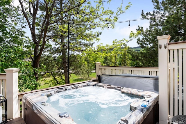 6032 Umber St, Arvada, CO 80403 - wooden terrace with a hot tub