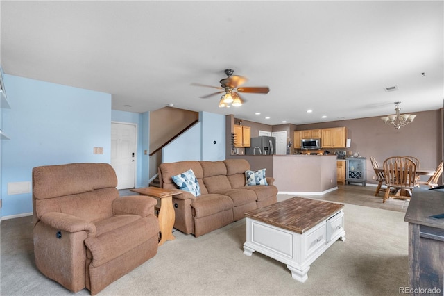 13664 Linden Ct, Thornton, CO 80602 - living room featuring a chandelier, ceiling fan, baseboards, recessed lighting, and light colored carpet