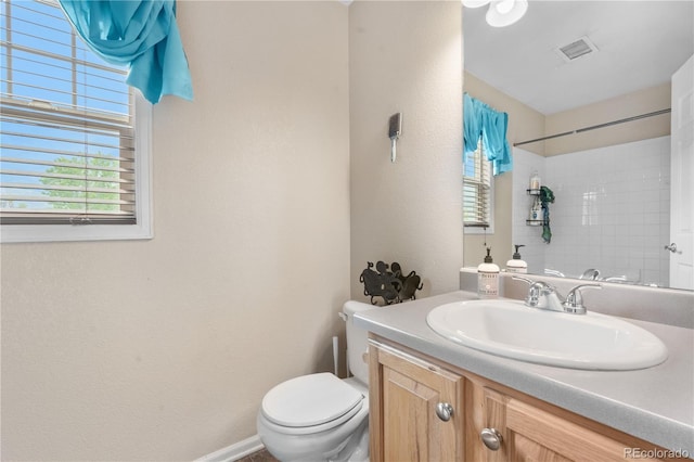13664 Linden Ct, Thornton, CO 80602 - full bathroom featuring toilet, vanity, a shower, and a textured wall