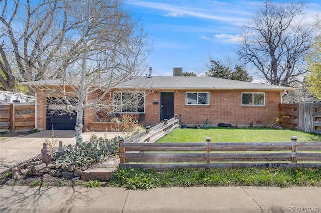 single story home featuring concrete driveway, brick siding, a garage, and fence
