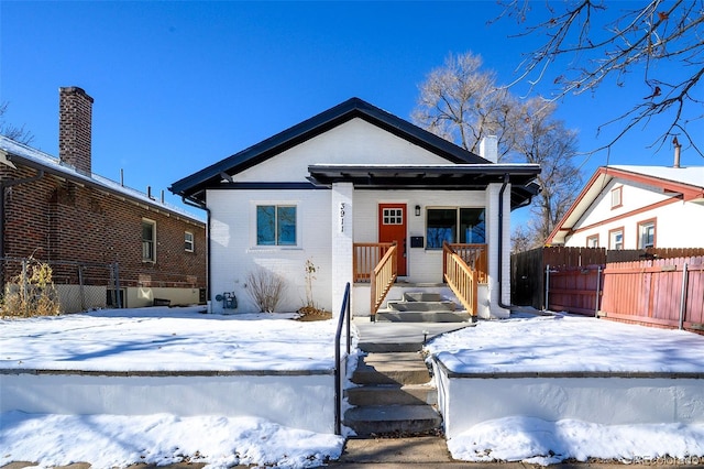 bungalow-style house featuring covered porch