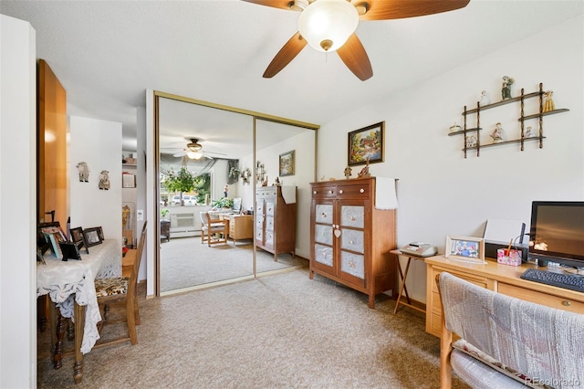 office featuring ceiling fan and carpet flooring