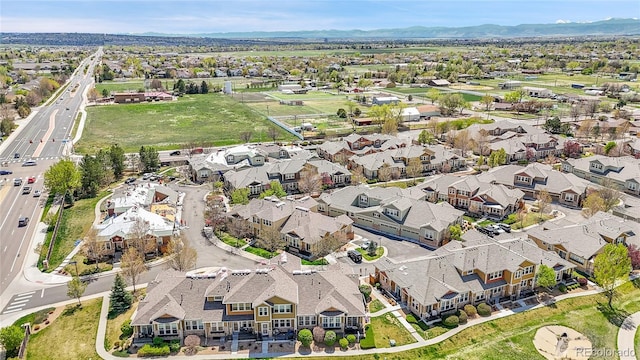 bird's eye view with a residential view and a mountain view