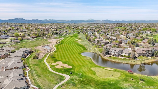3751 W 136th Ave Unit F4, Broomfield, CO 80023 - aerial view of property and surrounding area with a water and mountain view, nearby suburban area, and a golf club