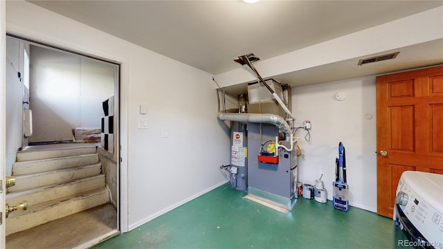 6631 Welch Ct, Arvada, CO 80004 - finished below grade area featuring stairway, baseboards, and gas water heater