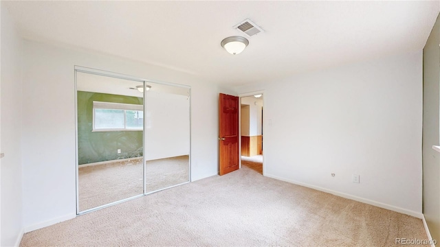6631 Welch Ct, Arvada, CO 80004 - unfurnished bedroom with carpet, a closet, and baseboards