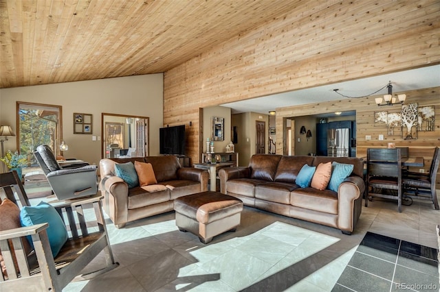 living room with high vaulted ceiling, tile patterned floors, wood walls, a chandelier, and wood ceiling